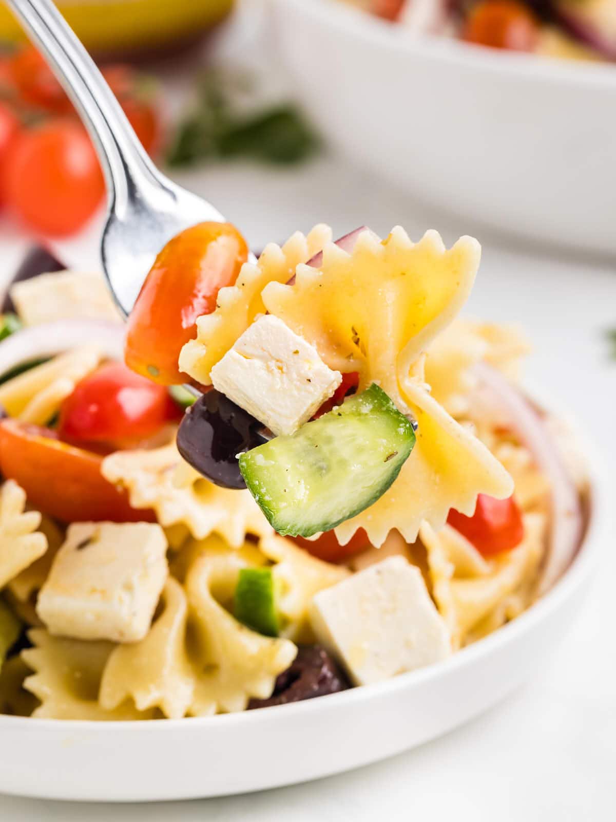 A forkful of Greek Pasta Salad recipe.