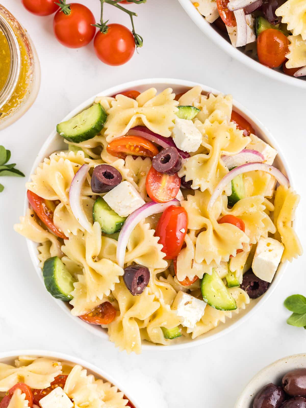 Topdown view of a plate filled with Greek Pasta Salad.
