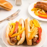 Two air-fried Chicken Sausages and Peppers in hot dog buns.