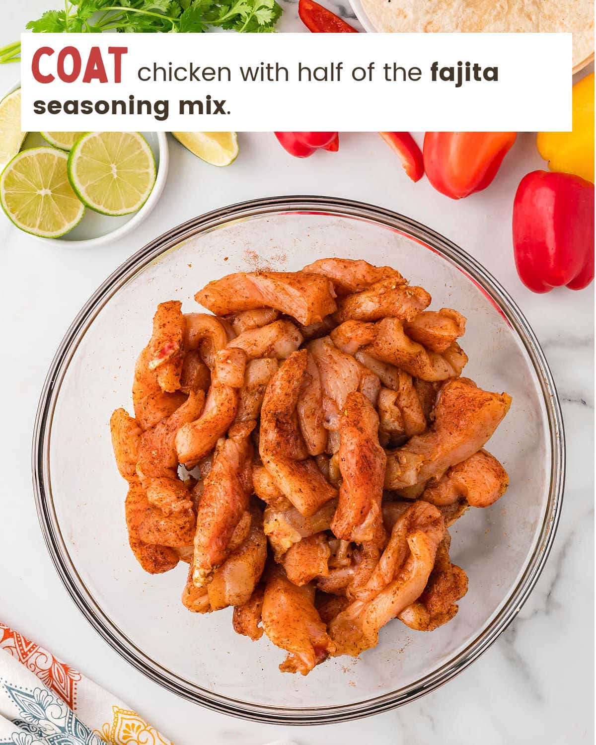 Seasoning chicken breasts for Crockpot Chicken Fajitas.