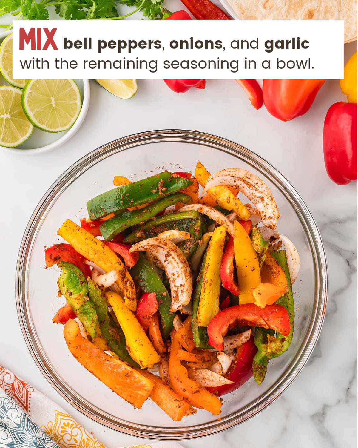 Seasoning vegetables for Crockpot Chicken Fajitas.