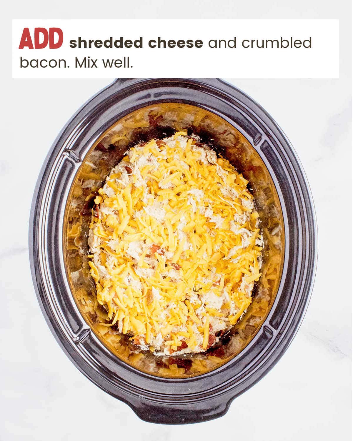Cheese, bacon and chicken in slow cooker for Crockpot Crack Chicken.