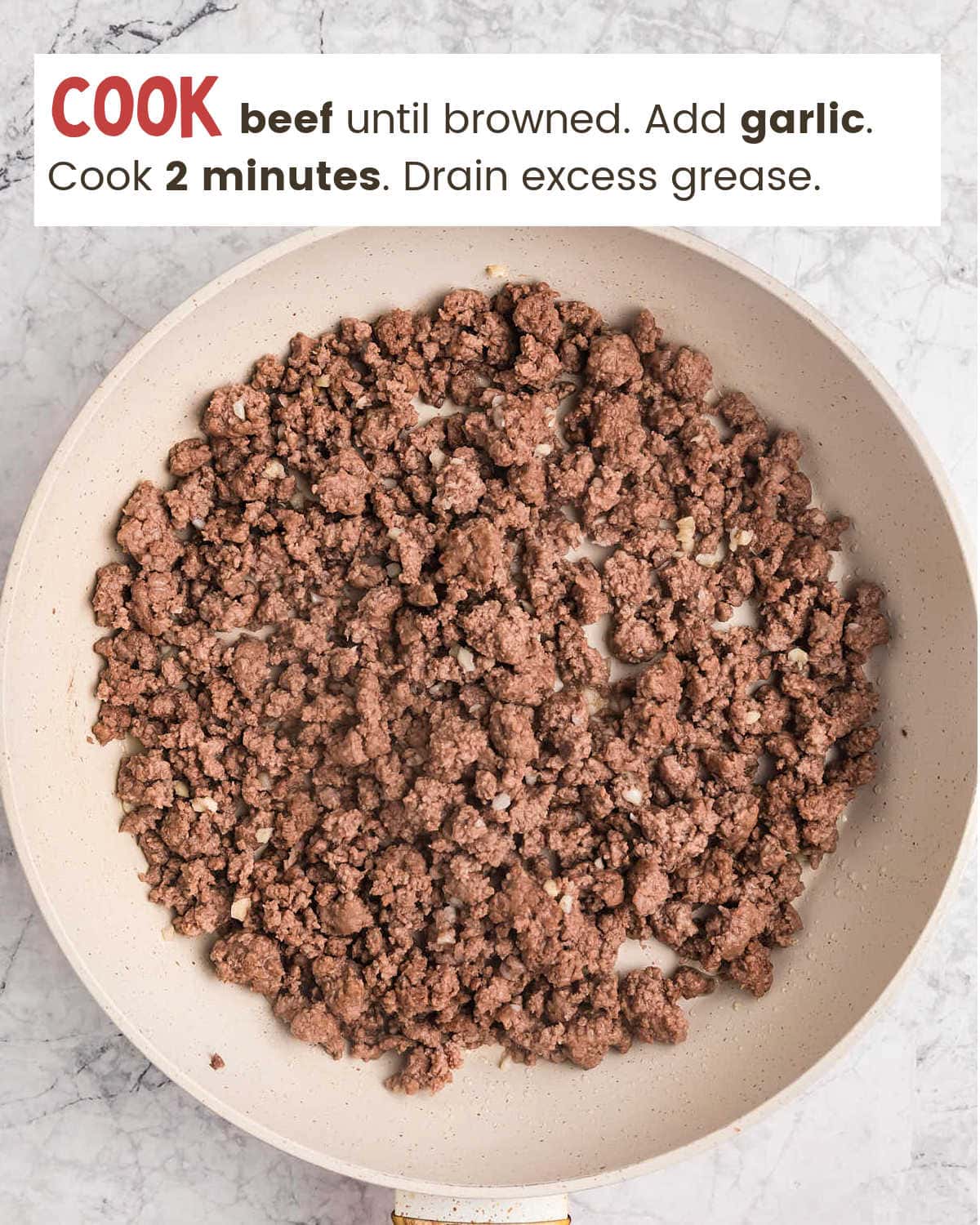 Browning beef for Crockpot Lasagna in a skillet.