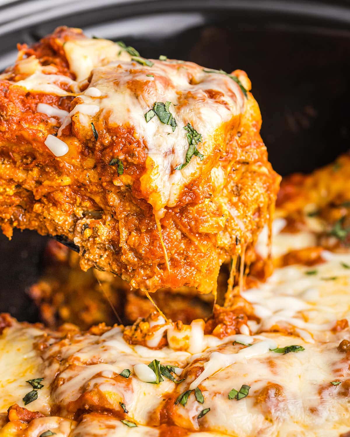 Closeup of a slice of  Crockpot Lasagna. 
