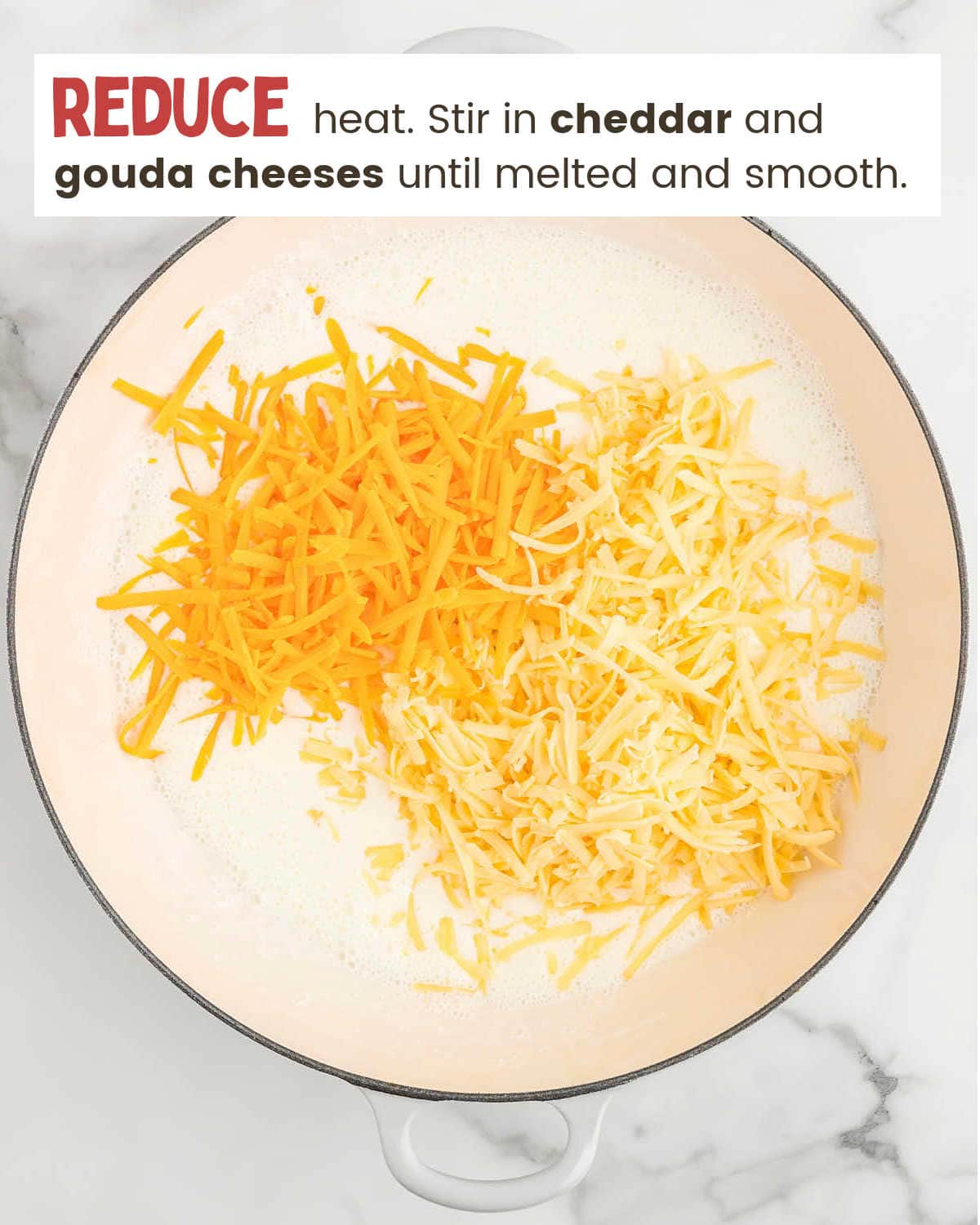 Adding cheese to saucepan for Gouda Mac & Cheese.