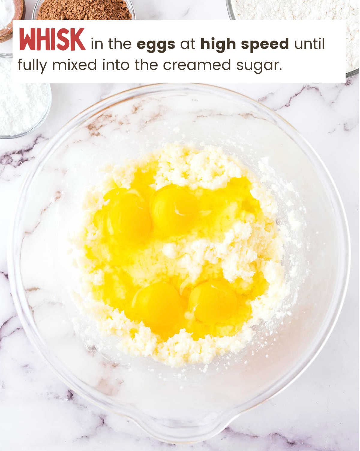 Adding eggs to sugar and butter for Oreo Sheet Cake.