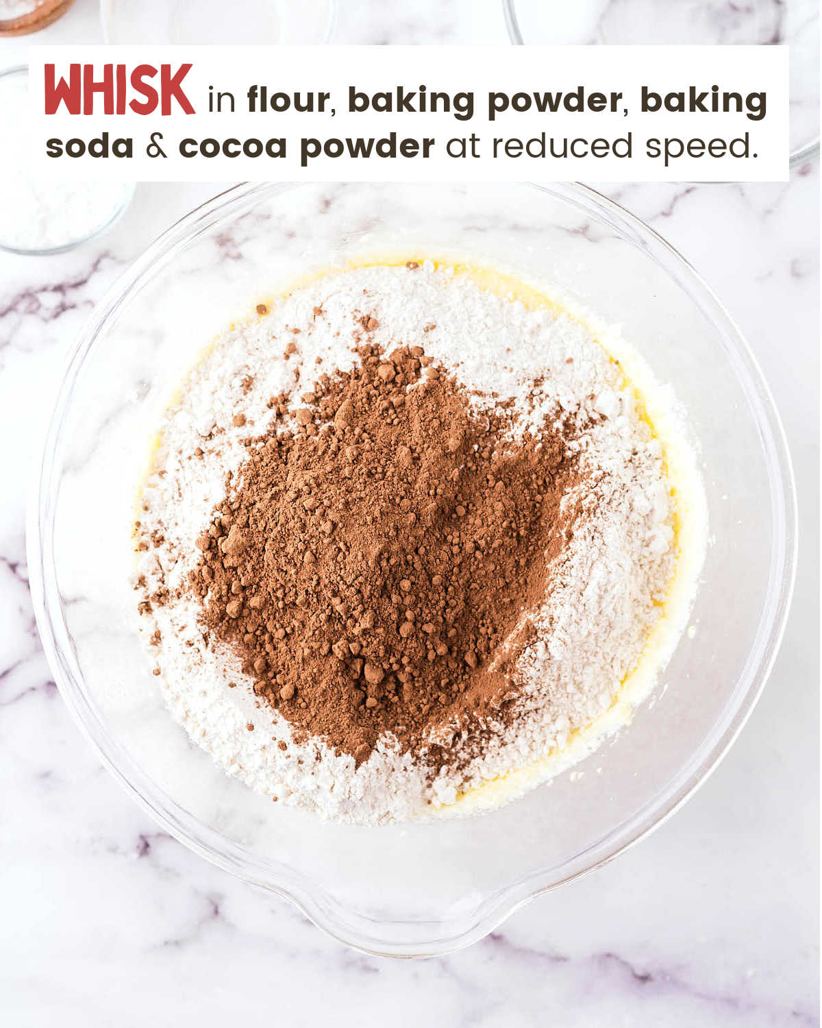 Adding dry ingredients to wet ingredients for Oreo Sheet Cake.