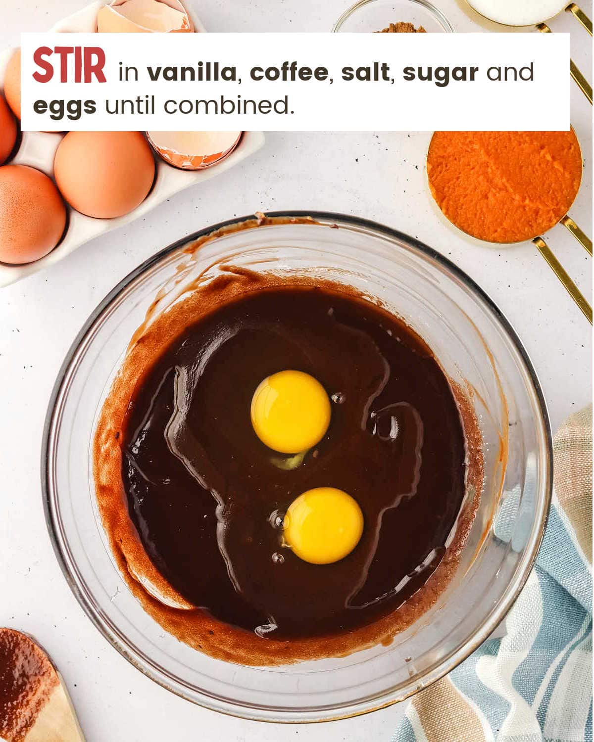 Add eggs to brownie batter for Pumpkin Cheesecake Brownies.