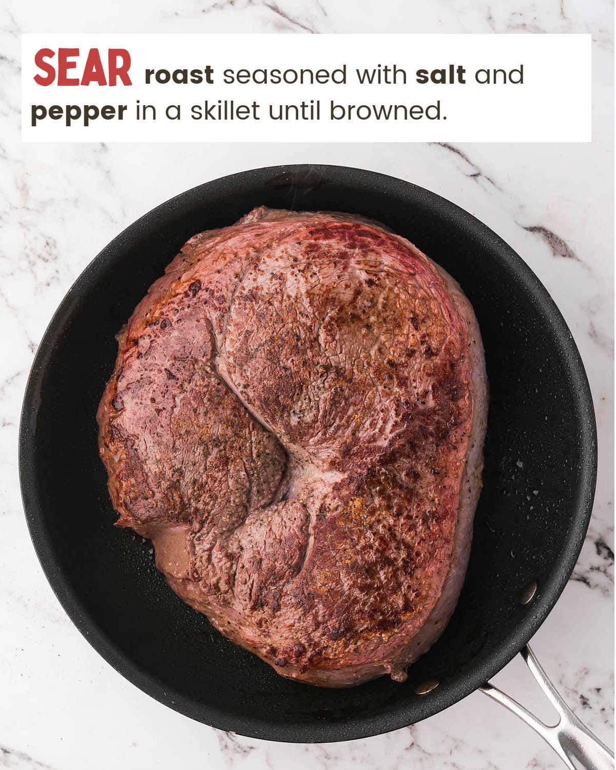 Seared roast in a skillet for Slow Cooker Sirloin Tip Roast.