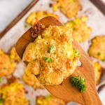 Parmesan Crusted Potatoes on a wooden spatula.