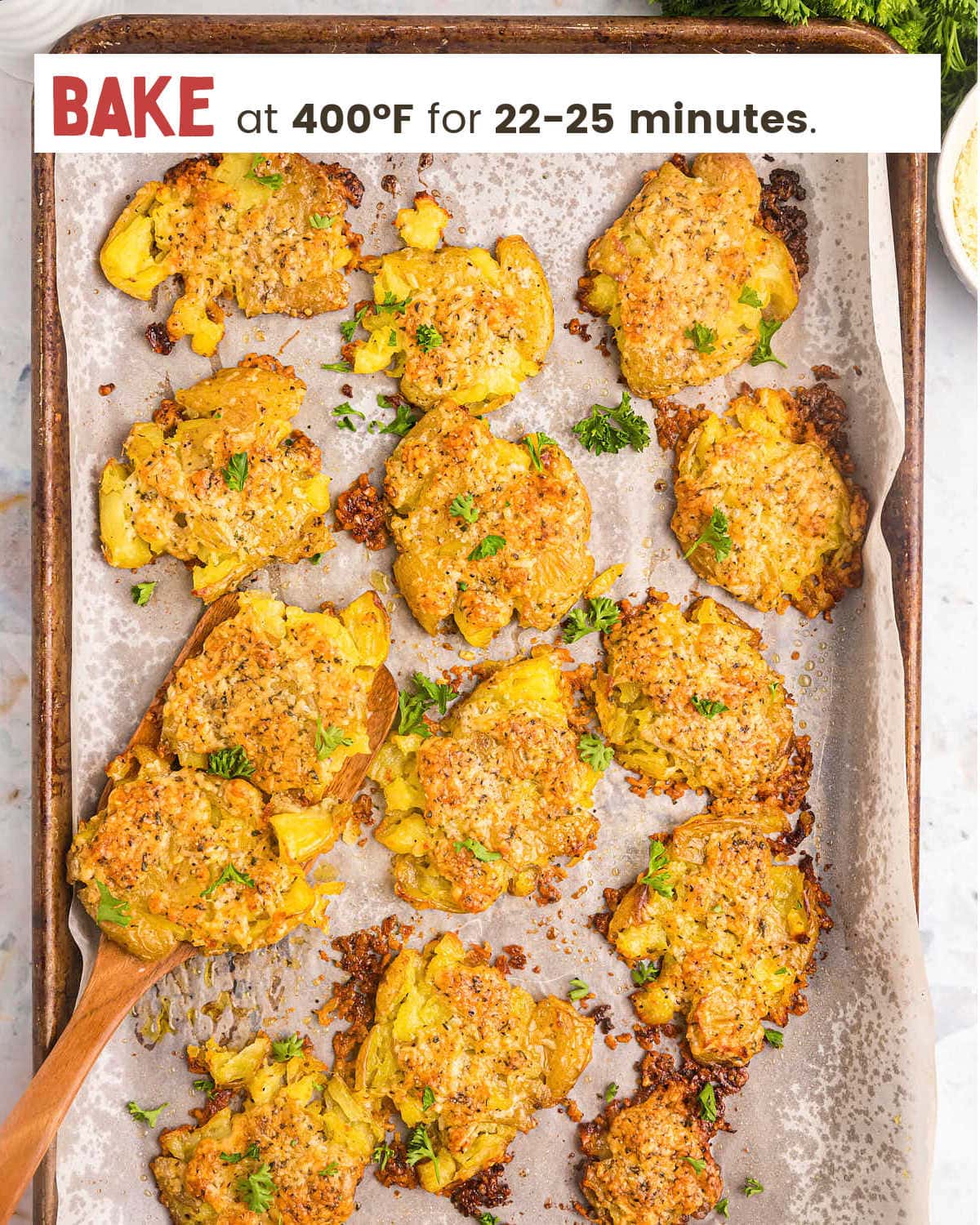 Crispy Parmesan Crusted Potatoes on a baking sheet.