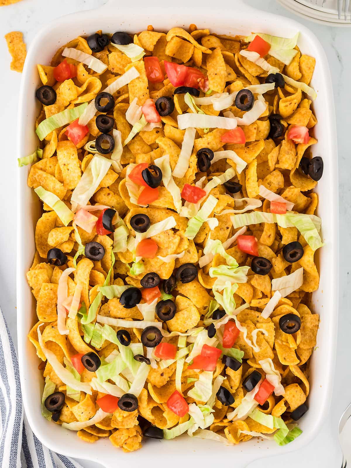 Top-down view of the Walking Taco Casserole in a baking dish.