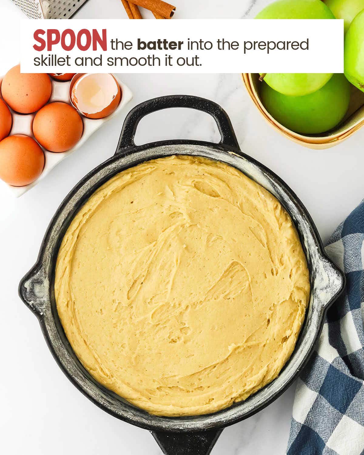 Smoothed batter in a skillet.