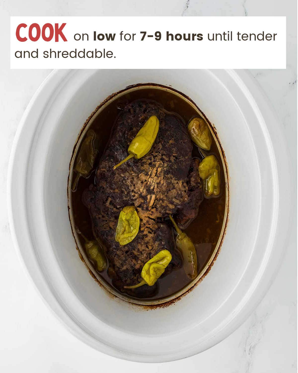 Cooked Mississippi Pot Roast in a slow cooker.