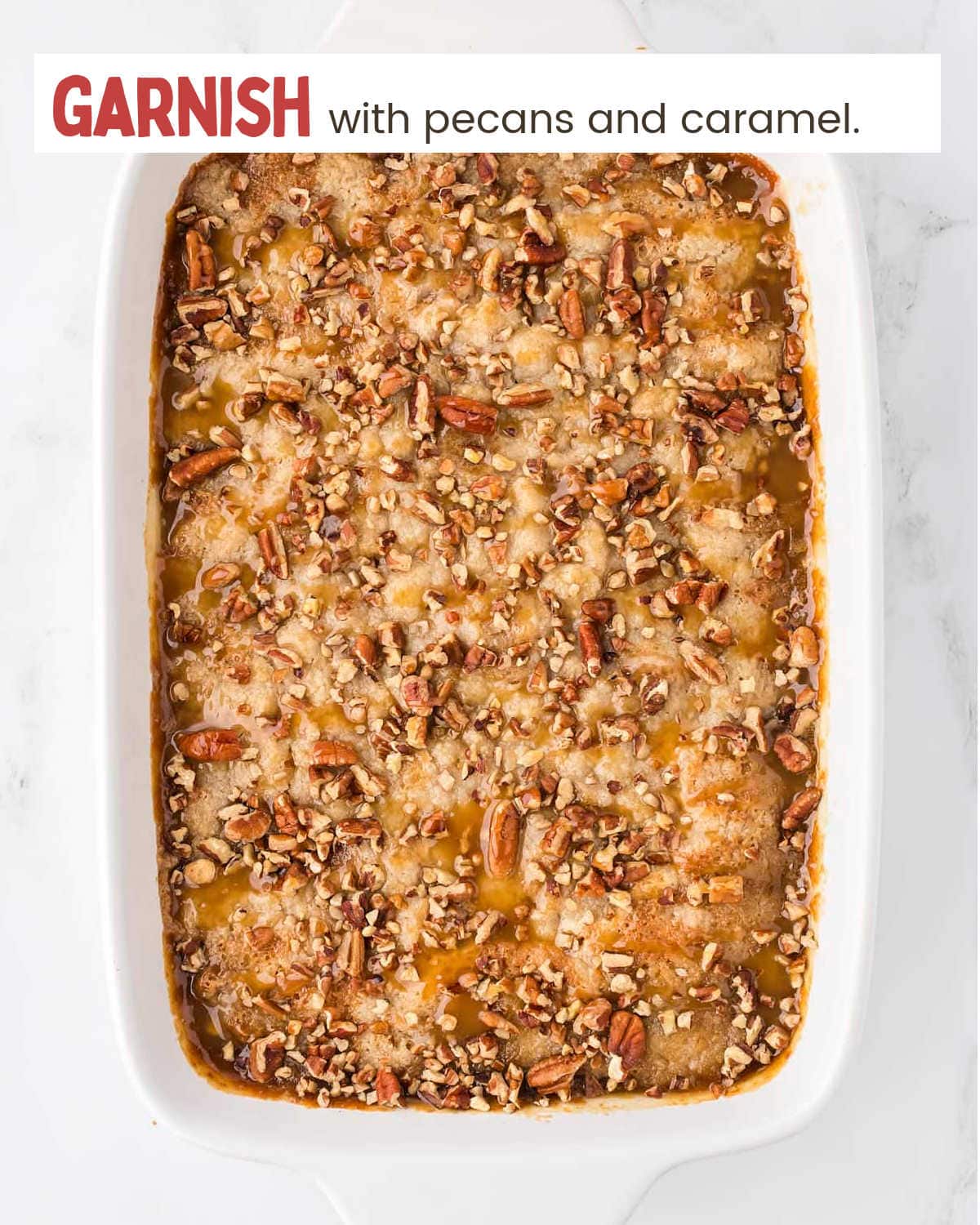 Garnishing Pecan Pie Dump Cake with pecans and caramel topping.