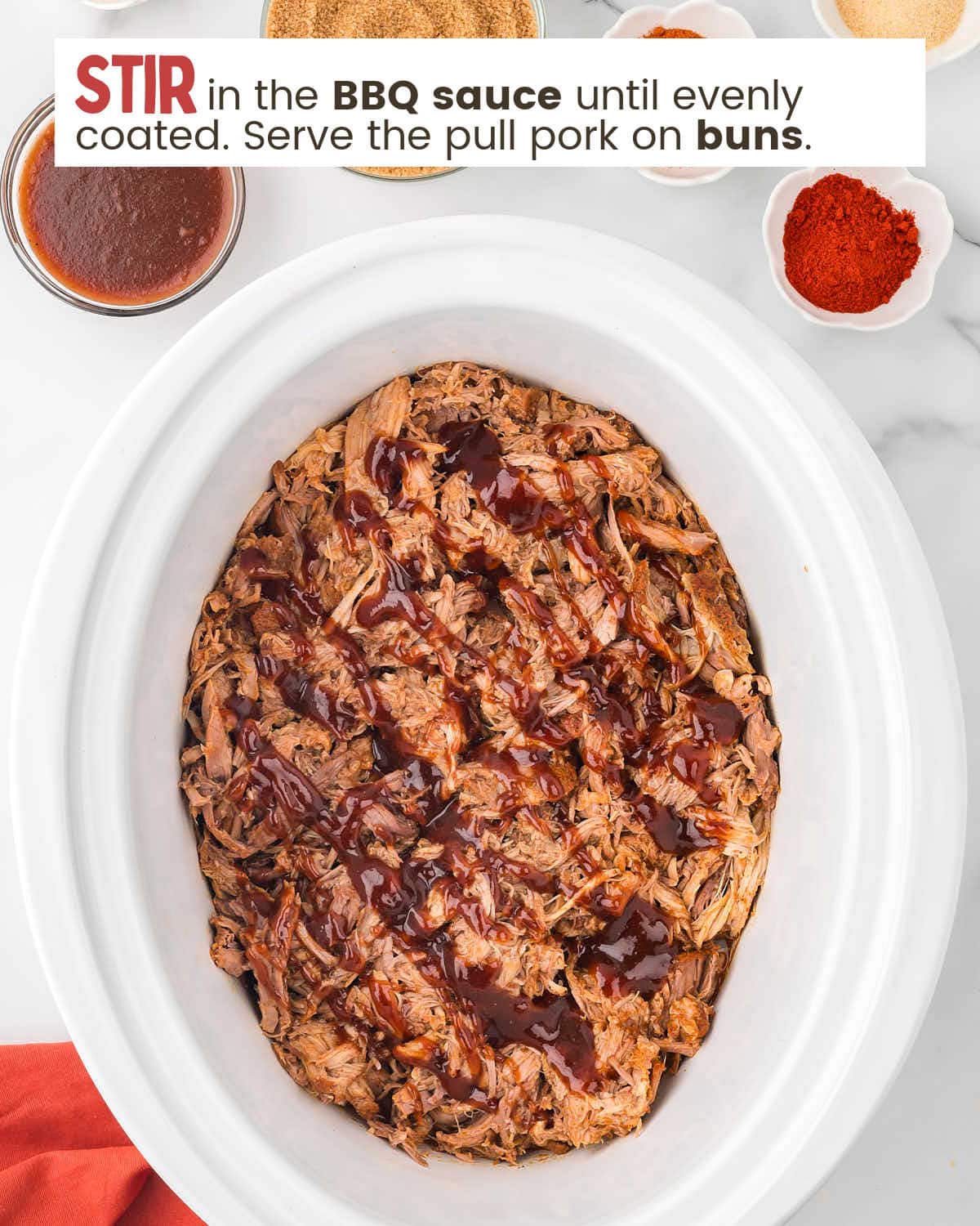 Pulled pork in a Crockpot with BBQ sauce.