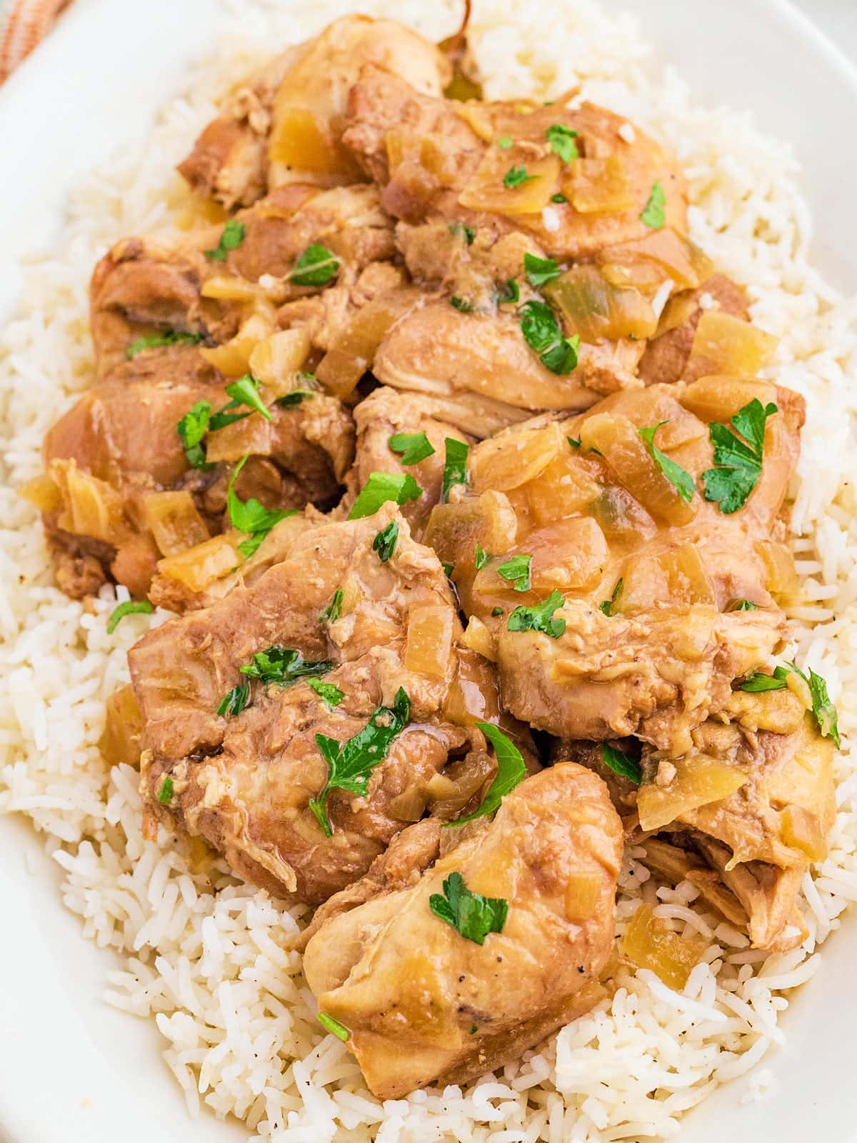Crockpot Adobo Chicken served over rice.
