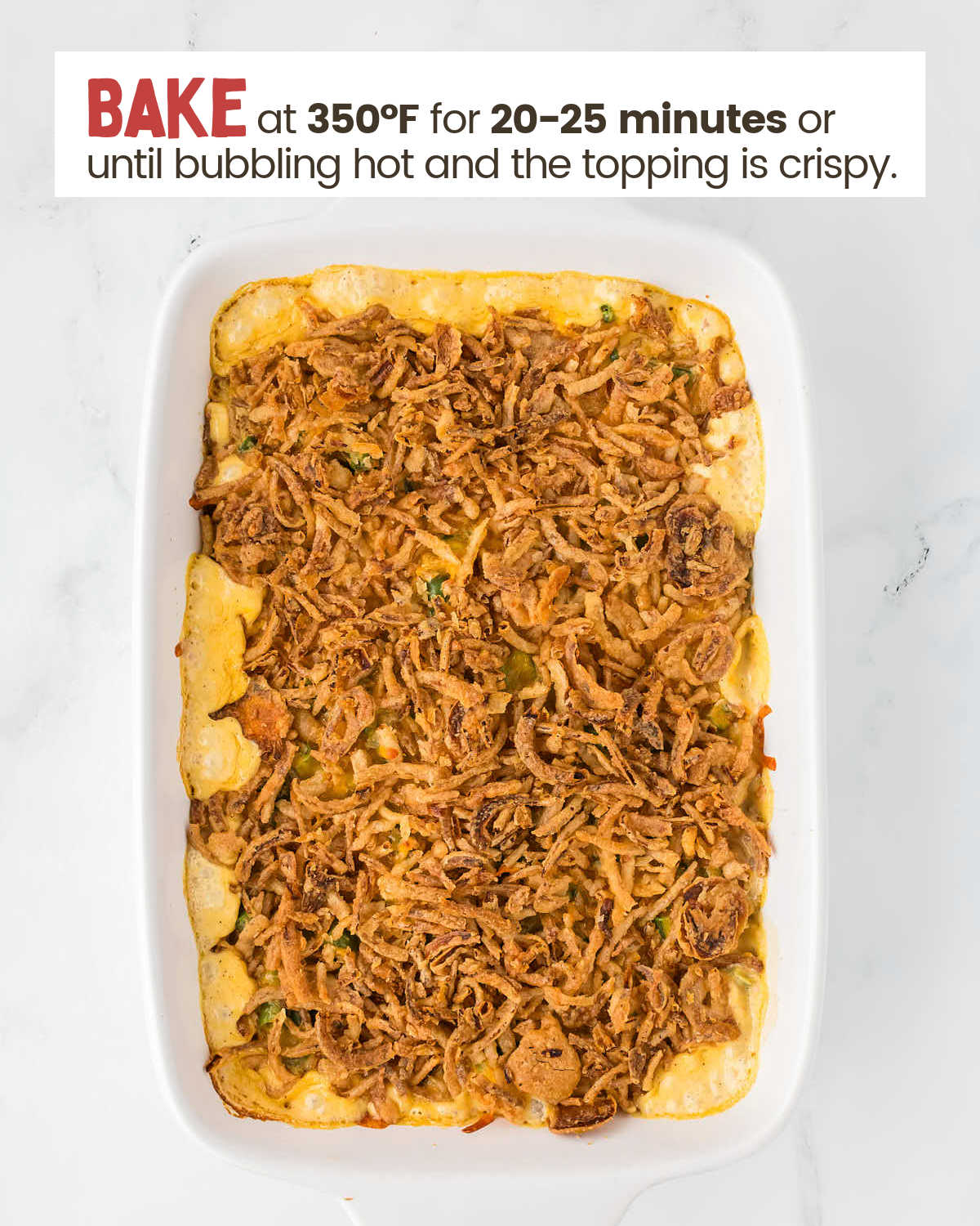 Baked green bean casserole in a casserole dish.