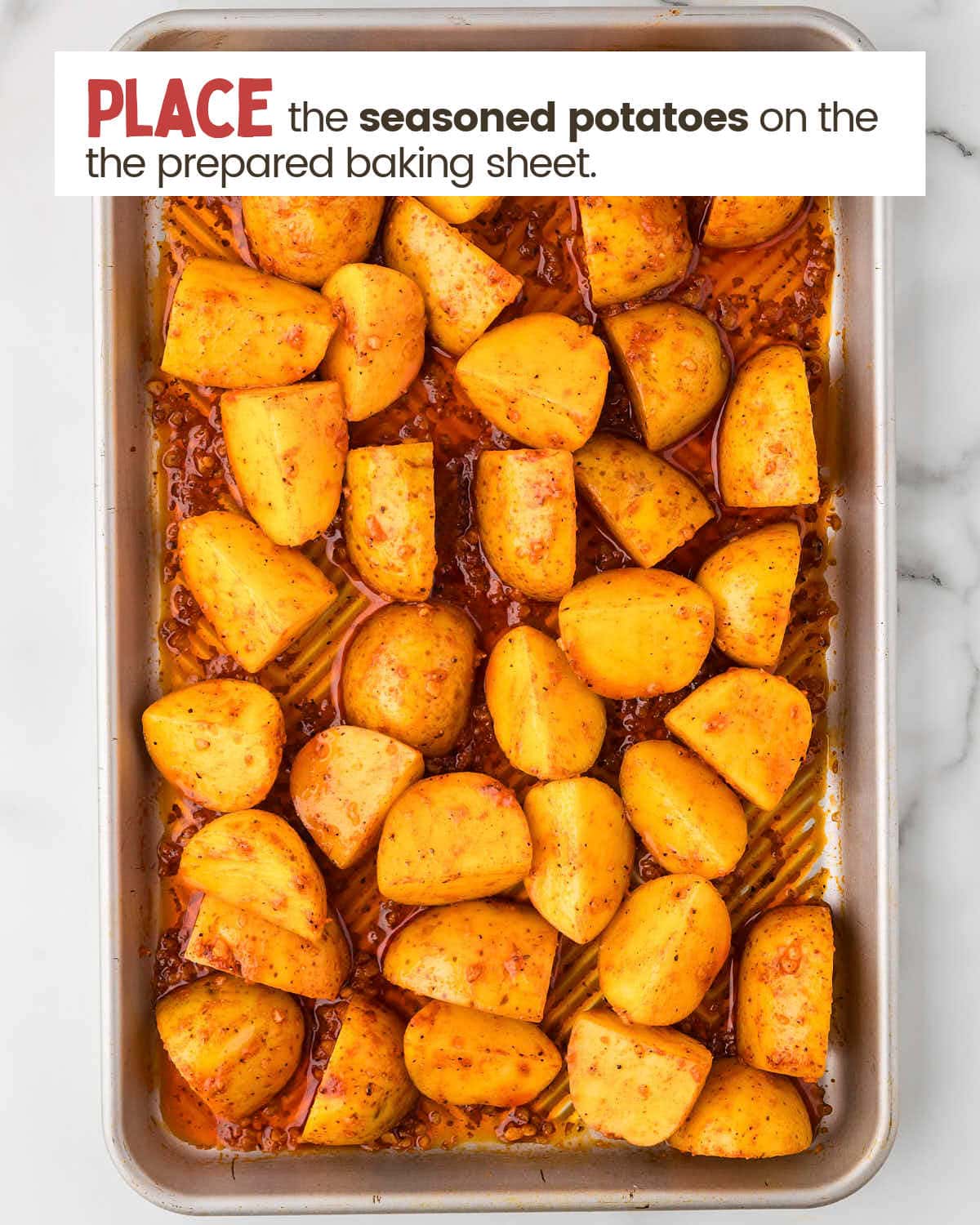 Seasoned Potatoes on a backing sheet.
