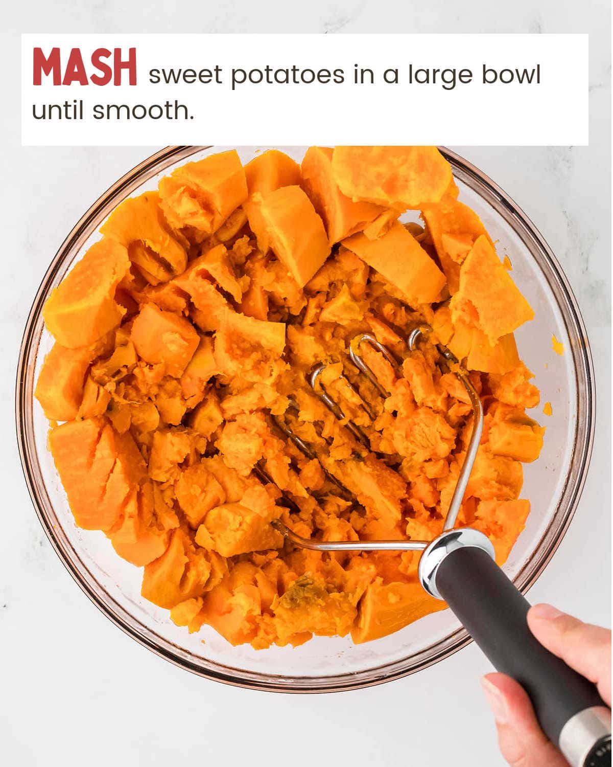 Mashing potatoes for Sweet Potato Casserole.