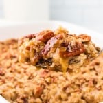 Closeup of a slice of Pecan Pie Dump cake scoop.