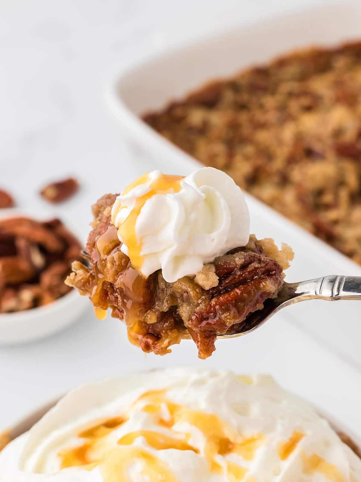 A spoonful of Pecan Pumpkin Pie.