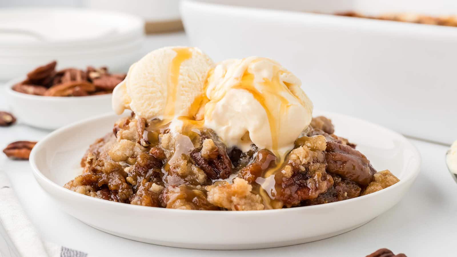 Pecan Pie Dump Cake recipe by Cheerful Cook.