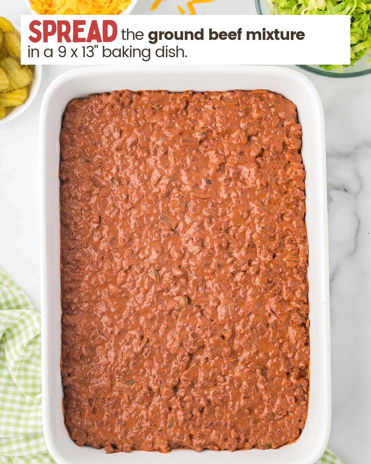 Cooked ground beef mixture in a 9 x 13" casserole dish.
