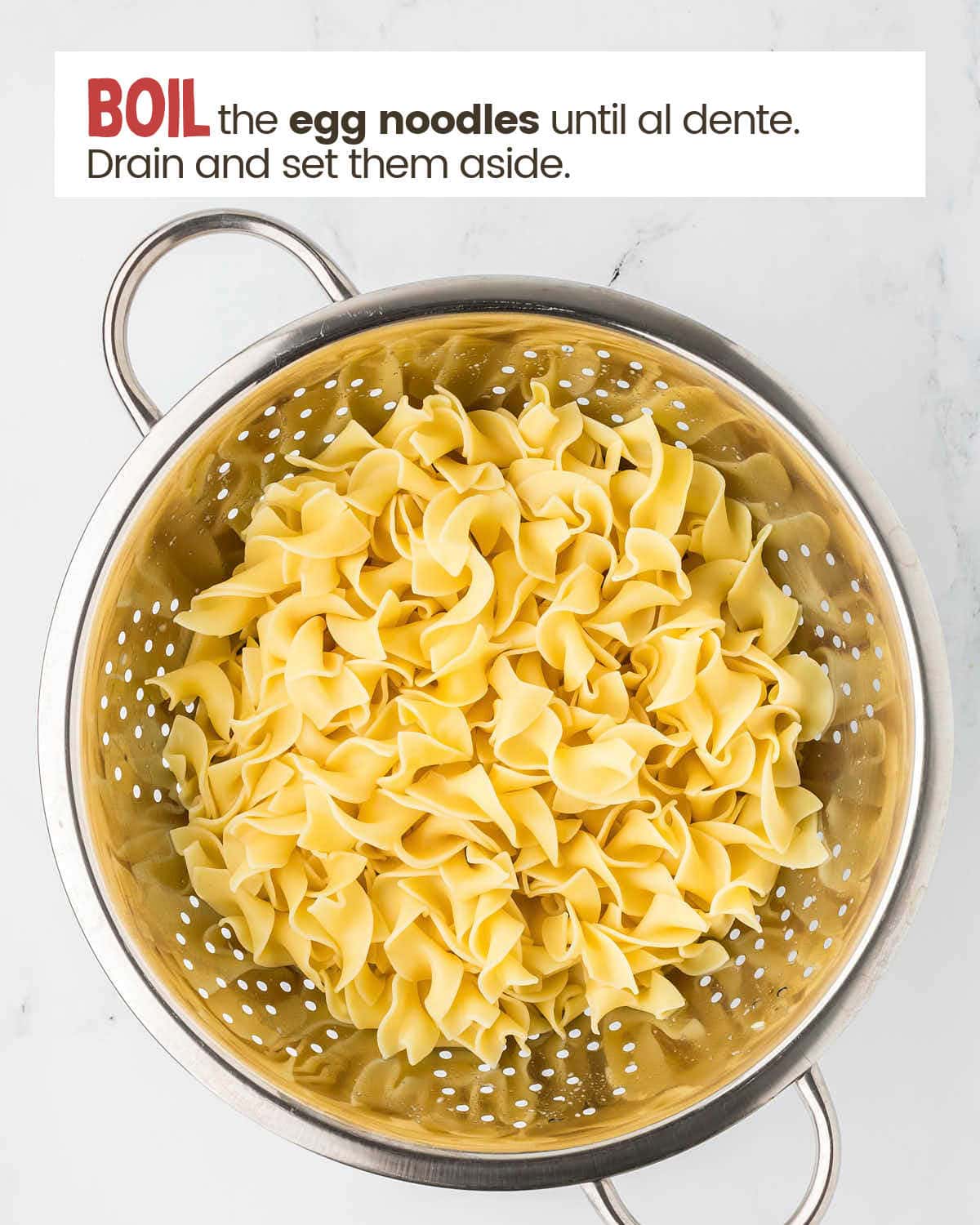 Noodles in a strainer. 