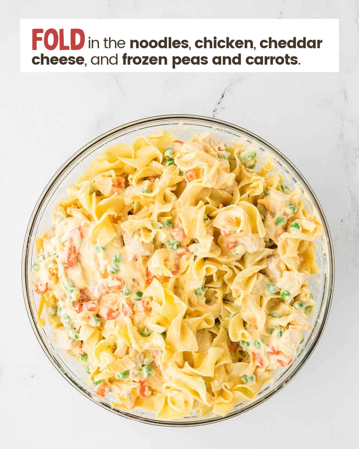 Chicken and noodle mixture in a bowl.