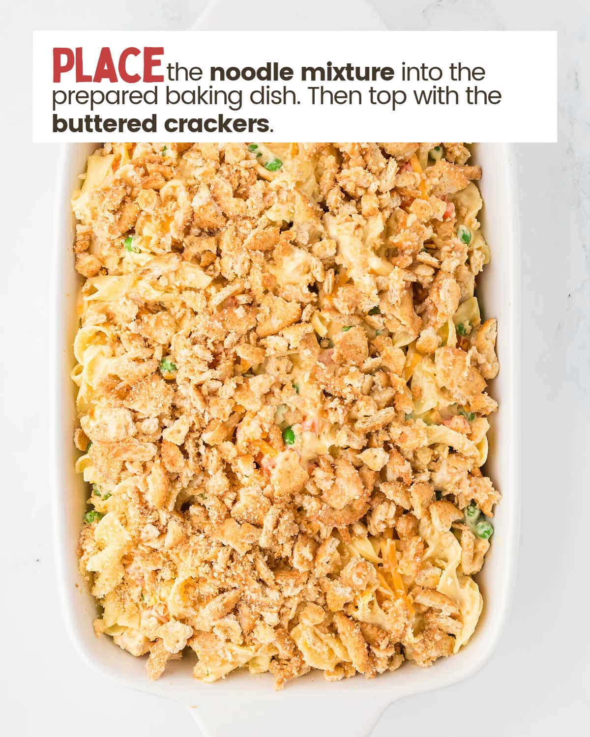 Unbaked Chicken and Noodle casserole in a baking dish.