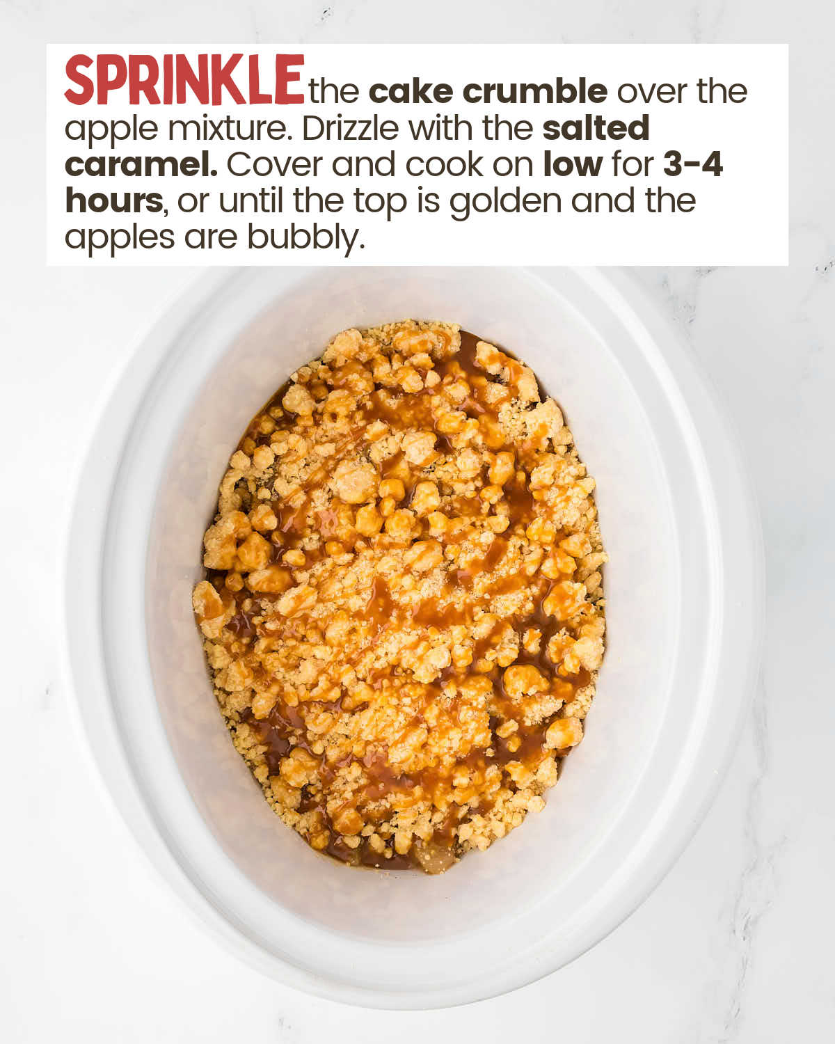 Cake mix crumble over apple pie filling in a slow cooker.