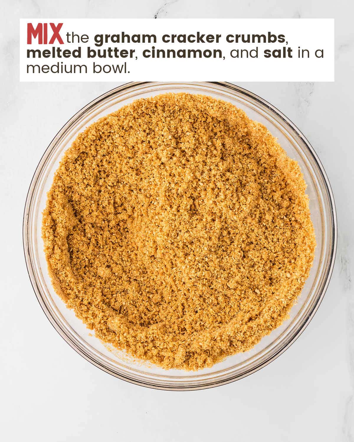 Graham cracker crust ingredients in a large bowl. 