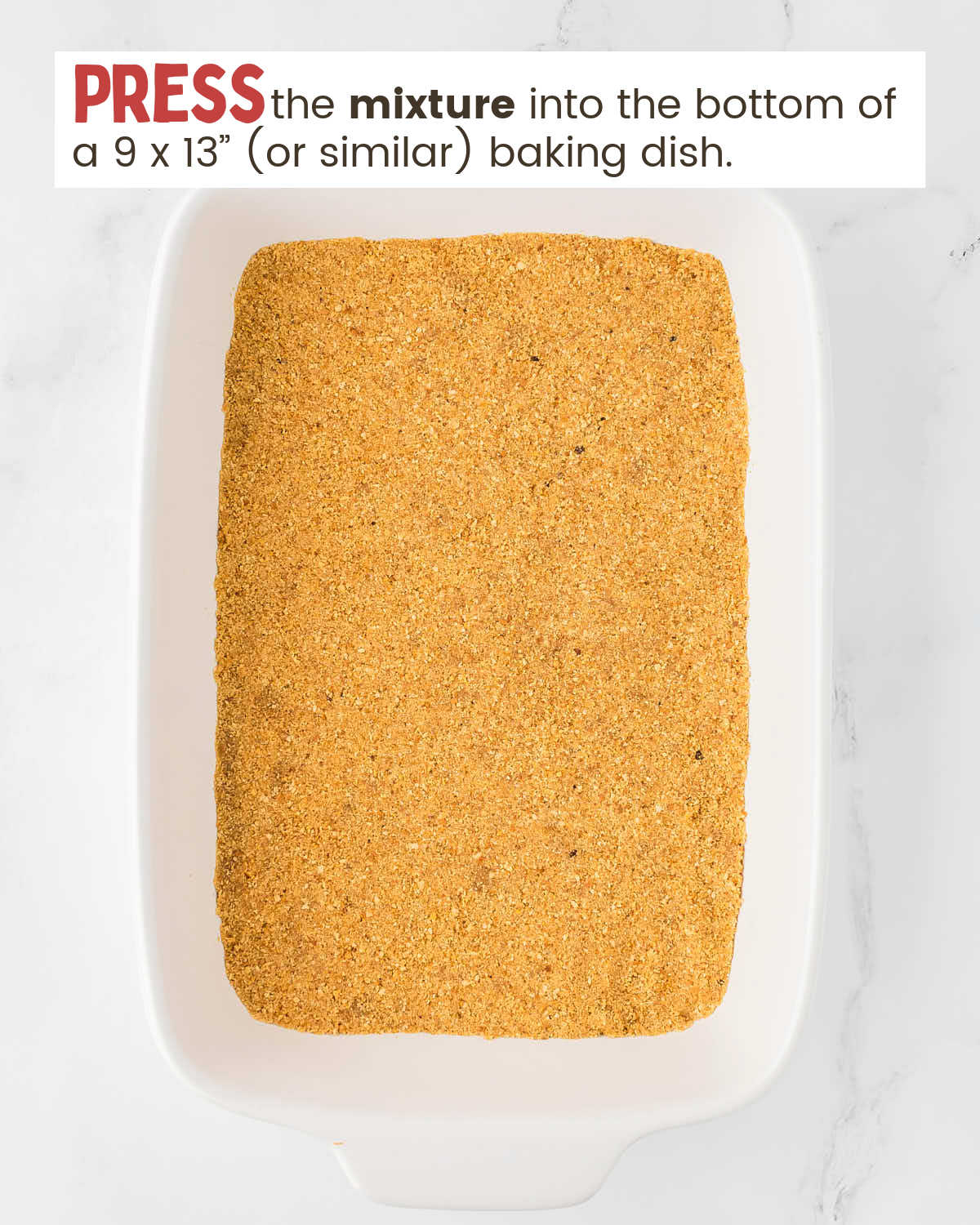 Graham cracker crust pressed into a baking dish.