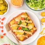 Topdown view of a slice of a slice of Big Mac Casserole.