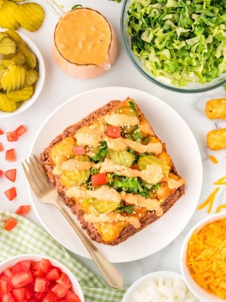Topdown view of a slice of a slice of Big Mac Casserole.