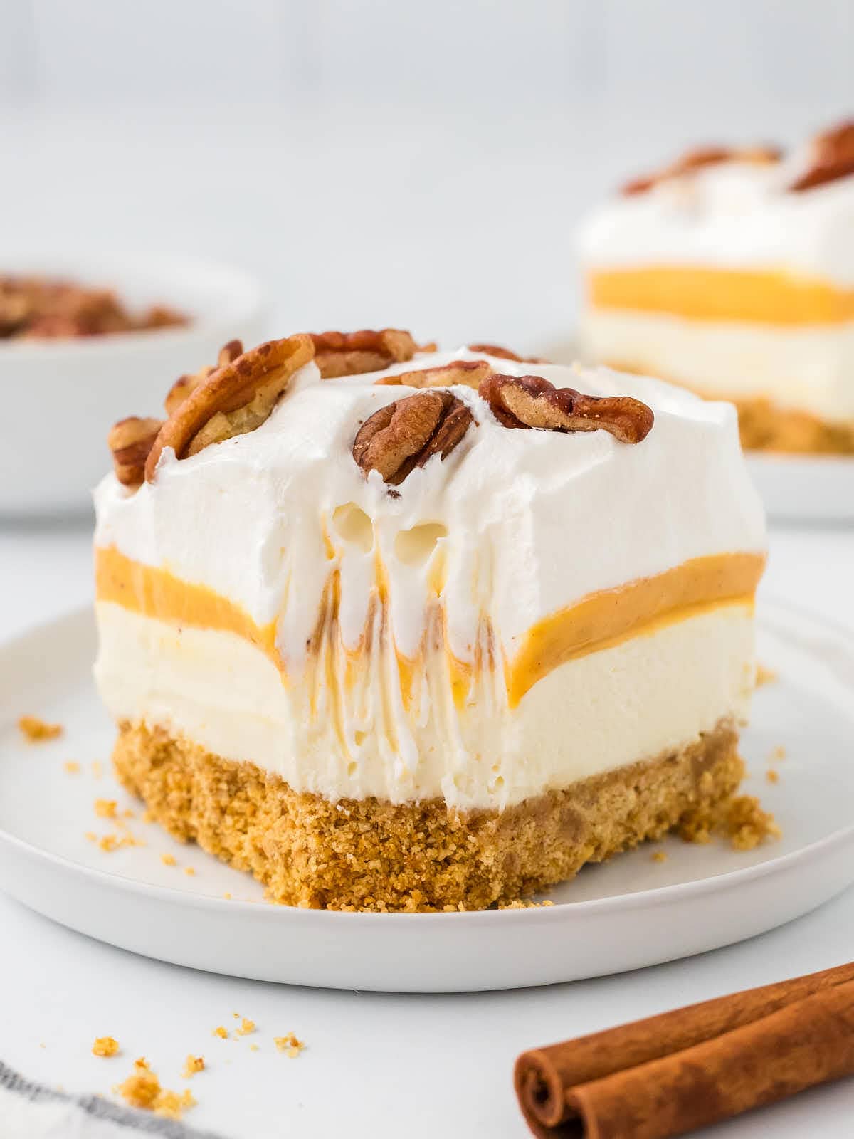 A slice of Pumpkin Delight on a white plate.