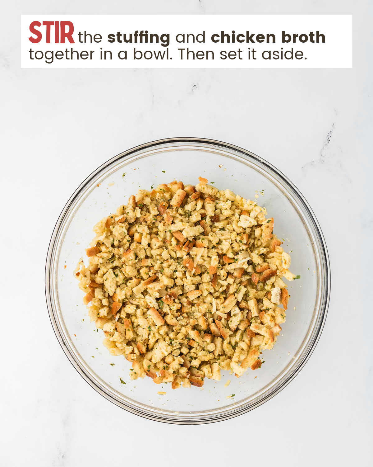 Stuffing in a large bowl for step 1 in the chicken and stuffing casserole. 