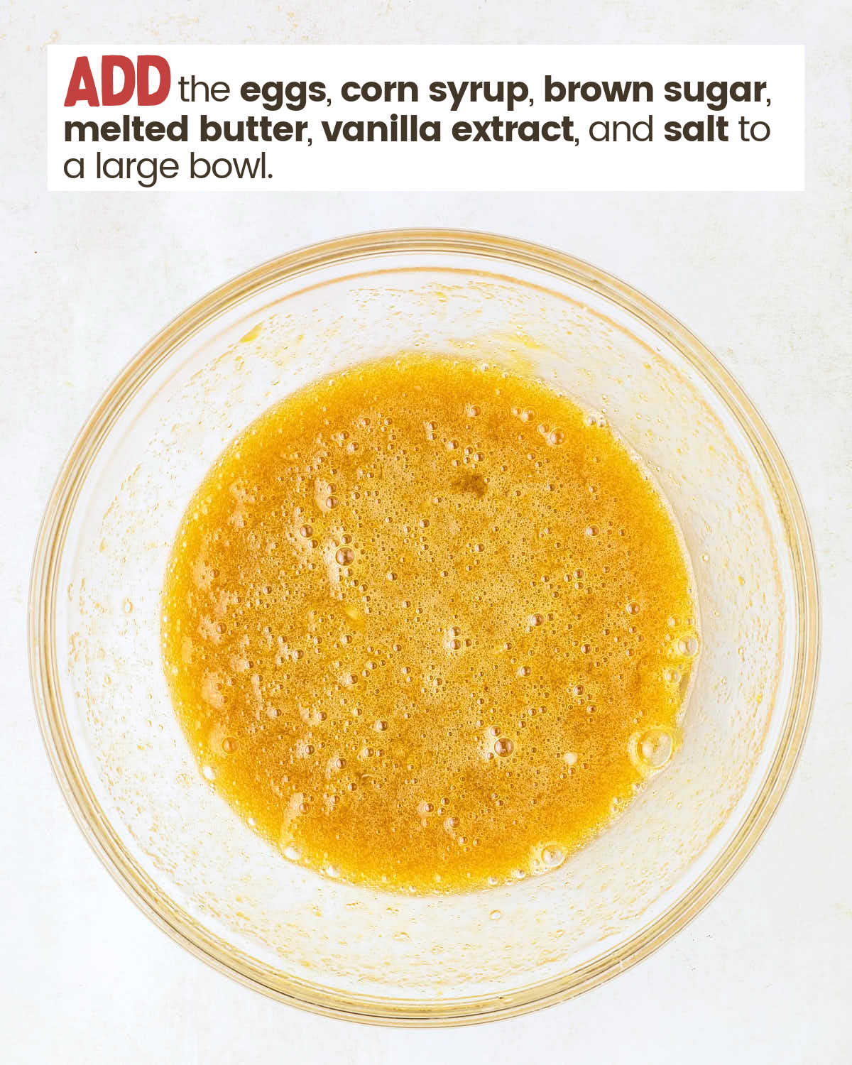 Ingredients to make a filling for chocolate pecan pie in a large bowl.