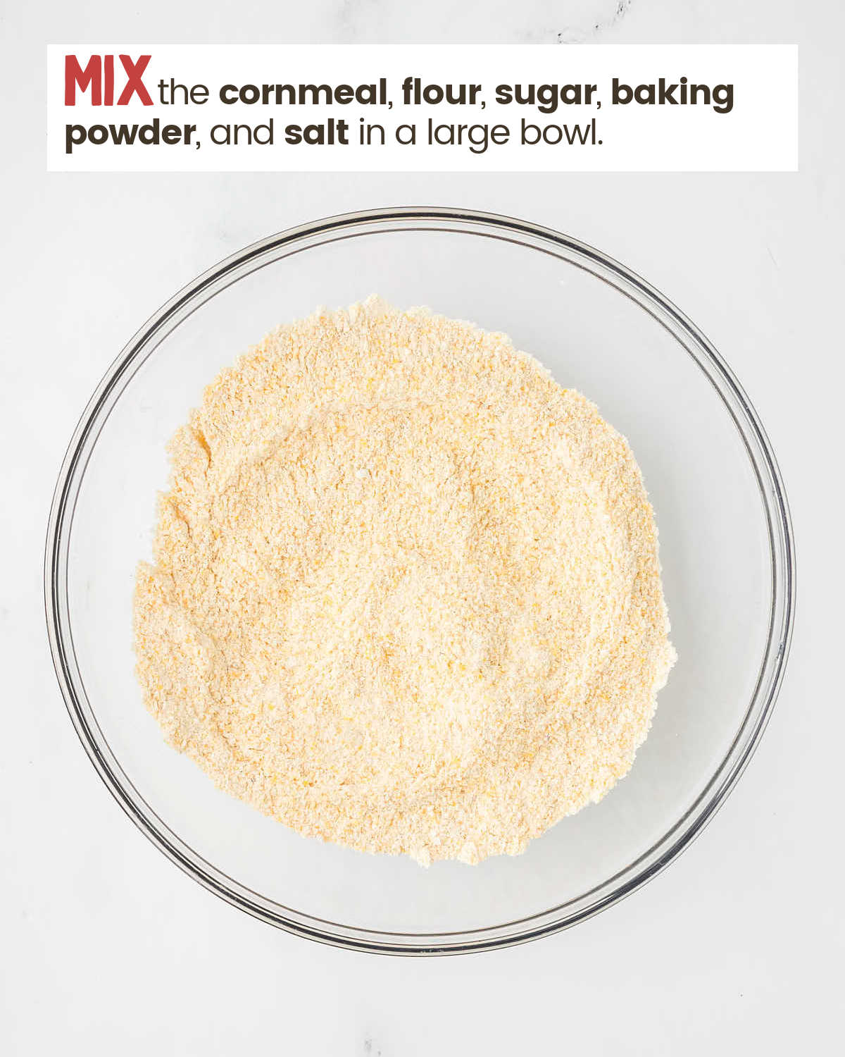Dry ingredients for cornbread in a bowl. 