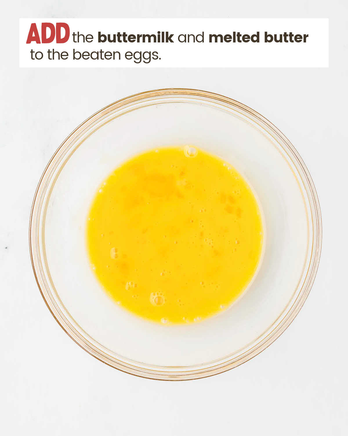 Beaten eggs in a bowl.
