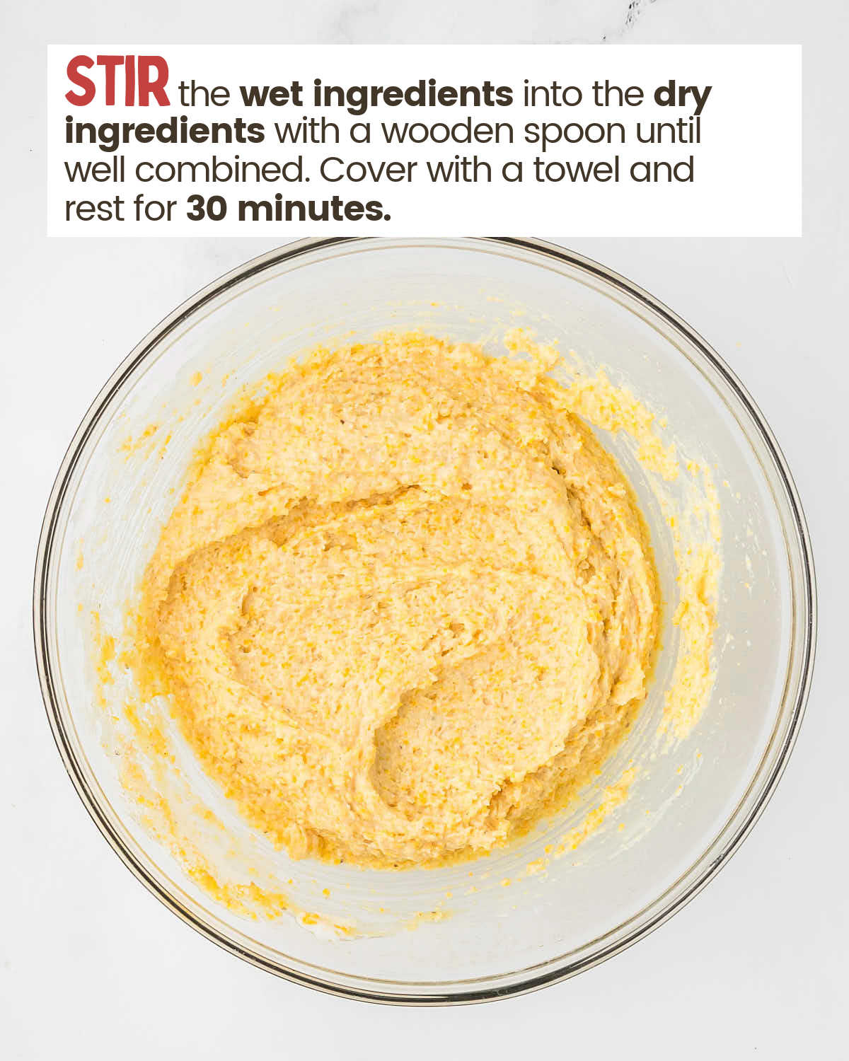 Cornbread batter in a bowl. 
