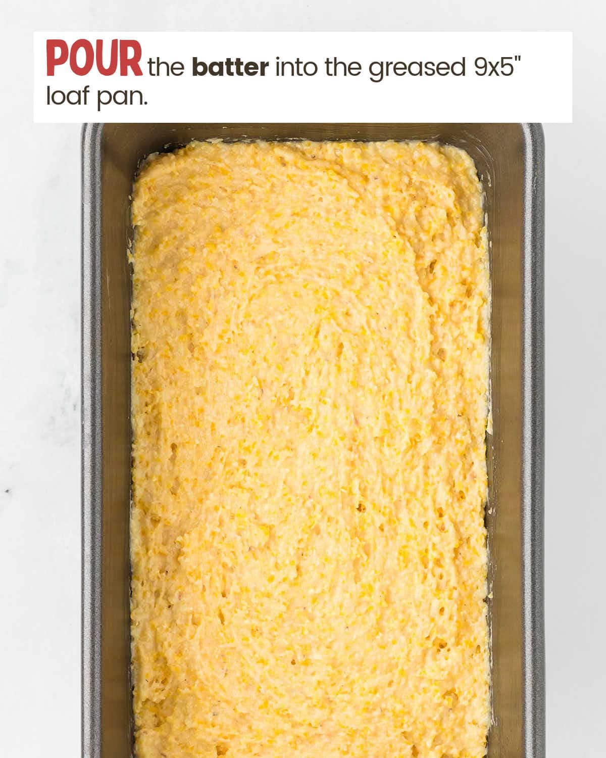 Cornbread batter in a loaf pan.