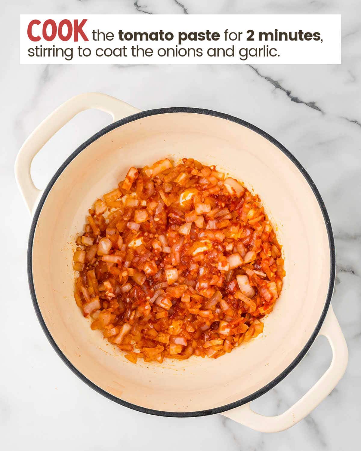 Base ingredients for ham and bean soup in a large pot.