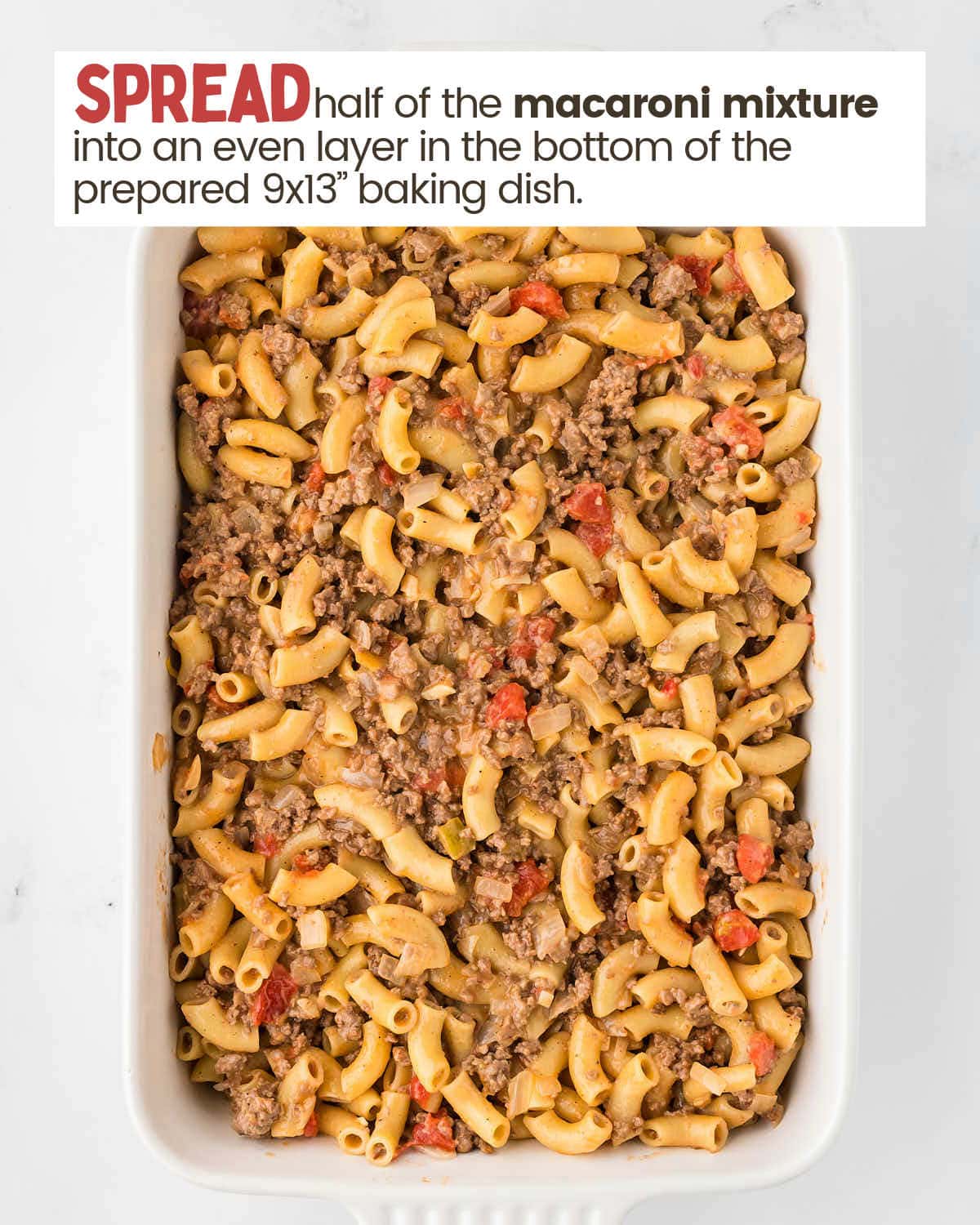 Macaroni and beef mixture in a baking dish.