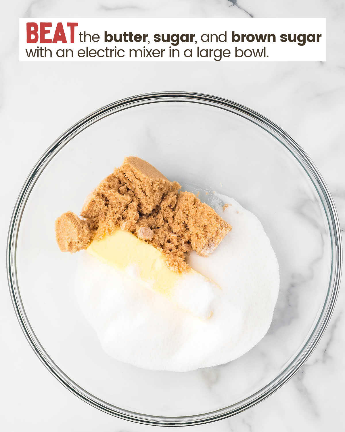 Butter, sugar, and brown sugar in a bowl.
