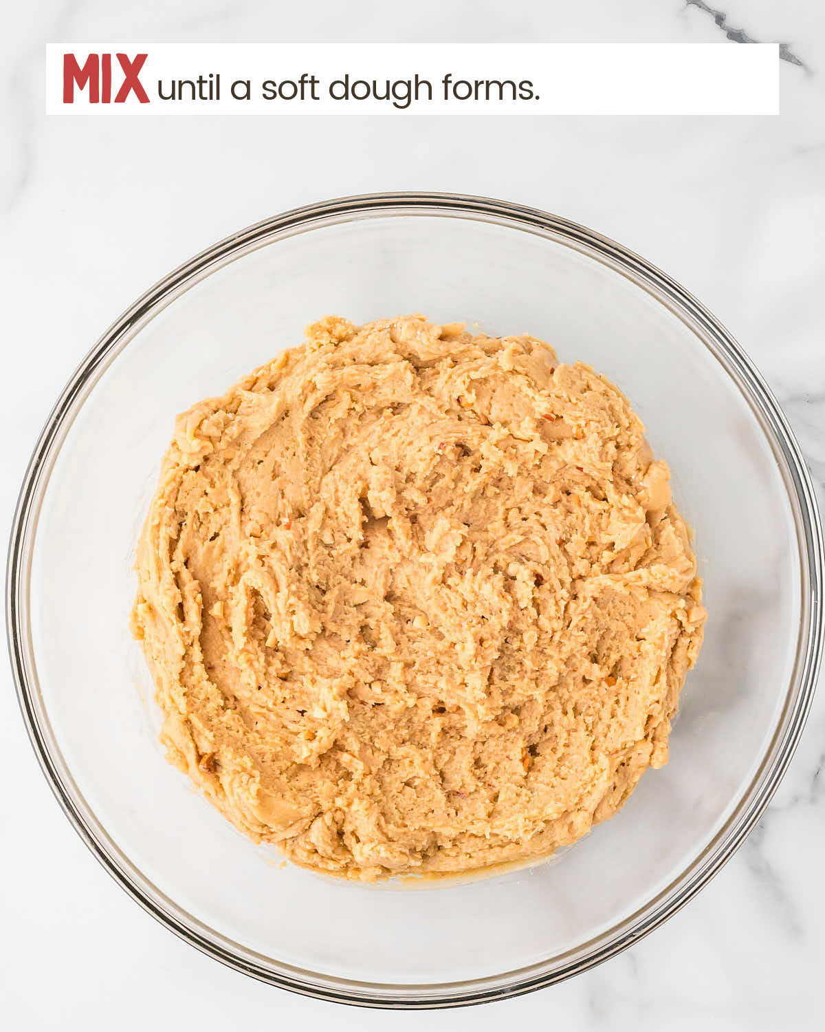 Peanut butter cookie dough in bowl.