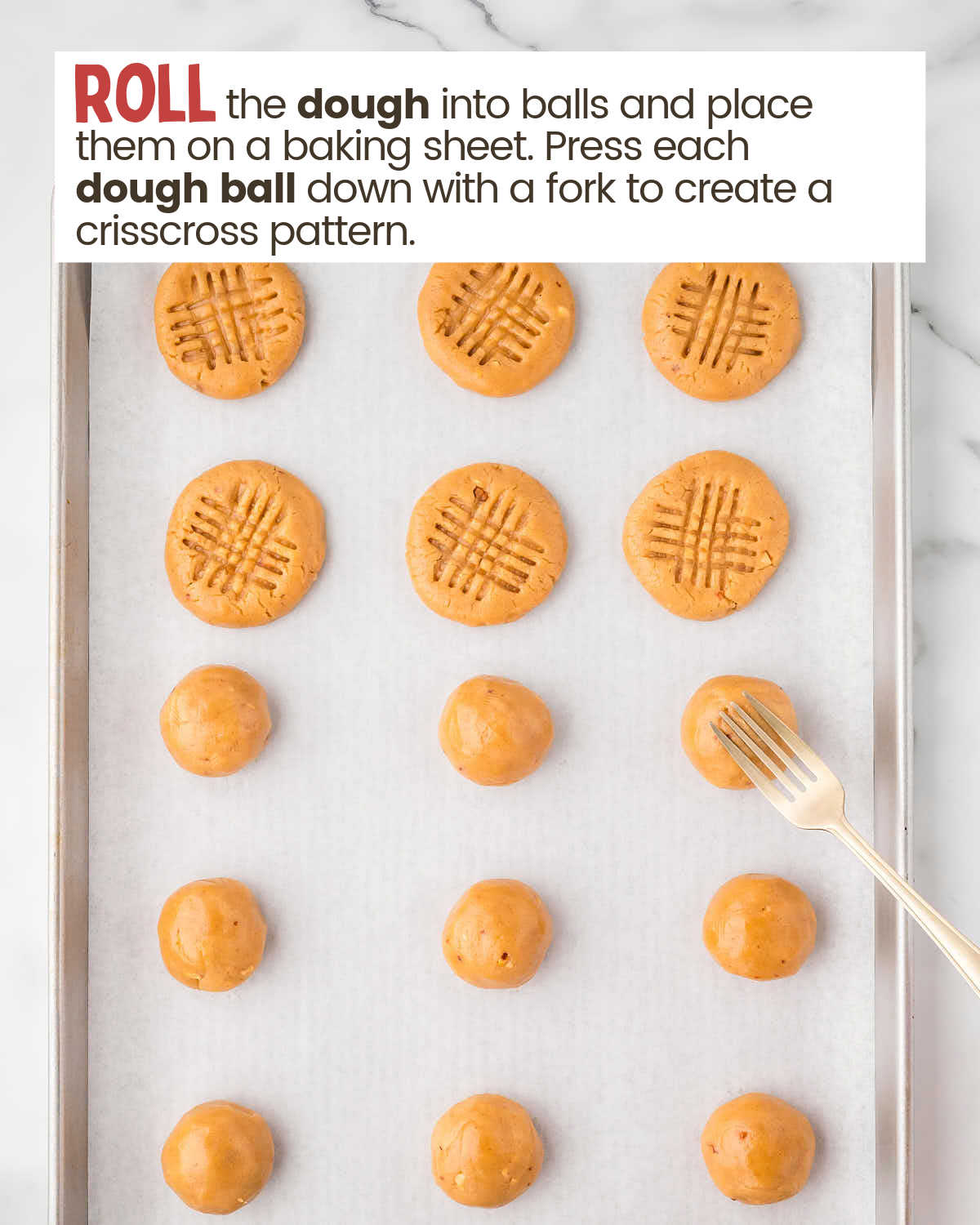 Peanut butter cookie dough balls and pressed dough on a baking sheet.