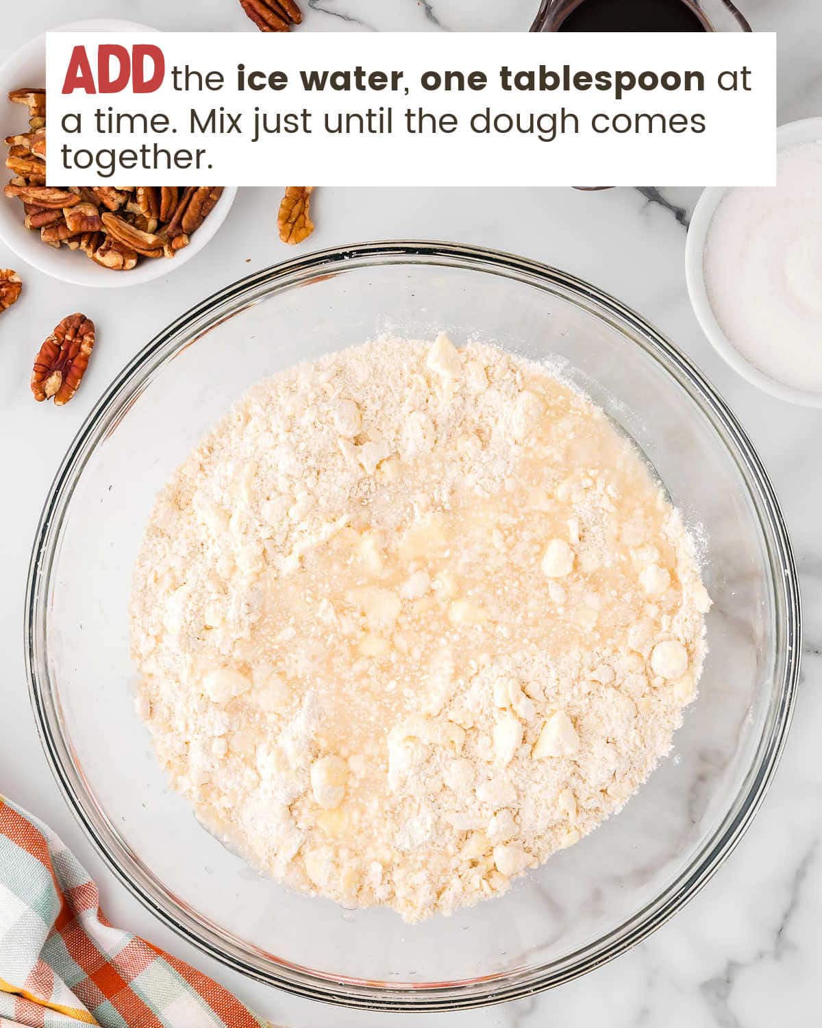 Pie crust ingredients in a mixing bowl.