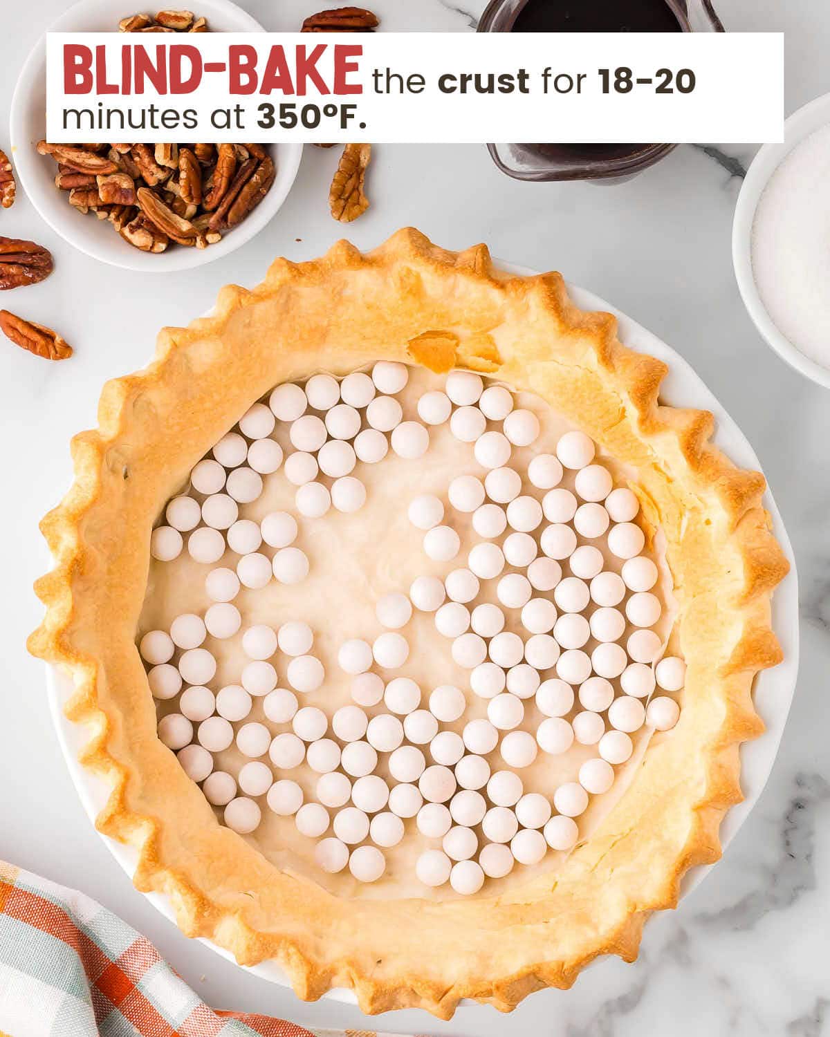 Bake Pie crust dough in a pie plate with the center lined with parchment paper and baking weights.